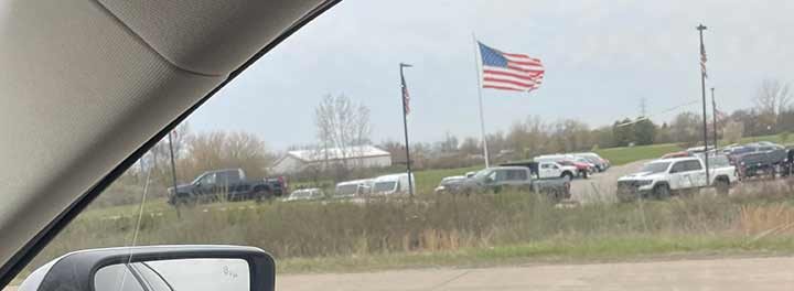 American Flag driving past Zillwalkee Bridge